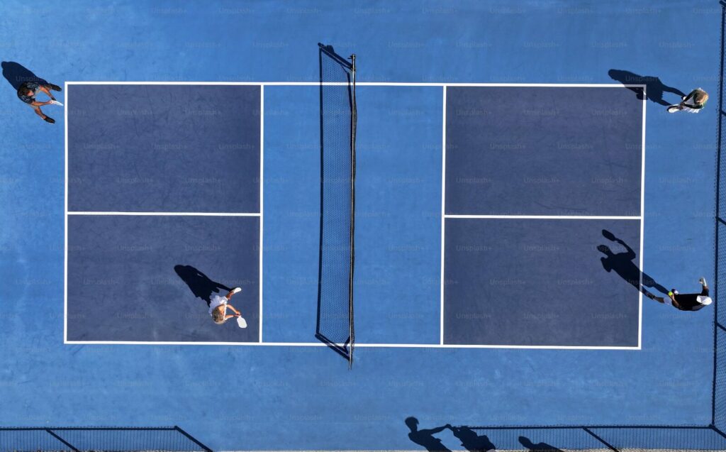 A standard pickleball court: 20 by 44 feet, no walls, hard surface, doubles or singles.